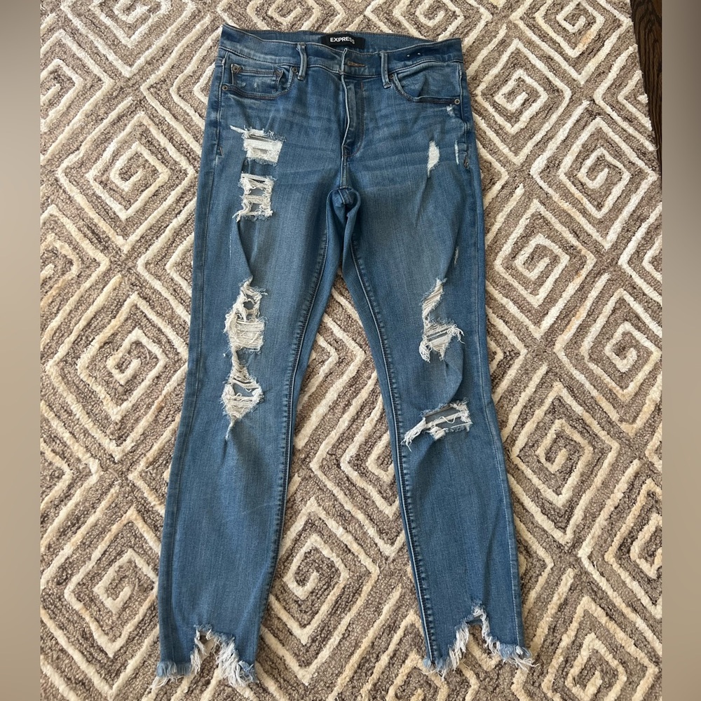 Express light wash ripped skinny jeans